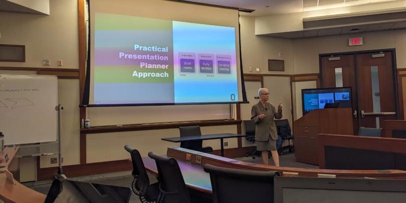 Dr. Lori Kendall teaching the MBA class about the art of giving Presentation.
