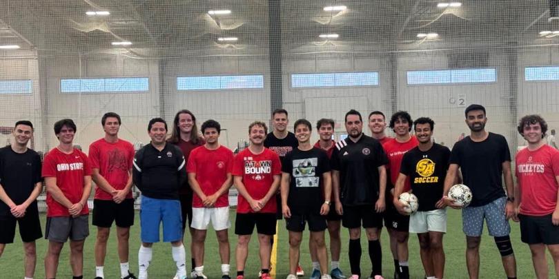 MBA students on a soccer field in the Ohio State ARC