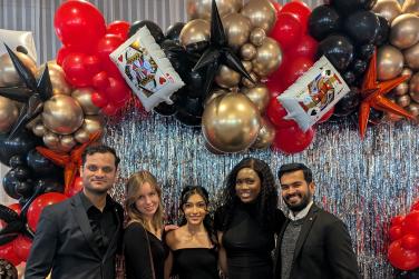 Omolayo with fellow students at the OUAB Valentine's Day Ball.