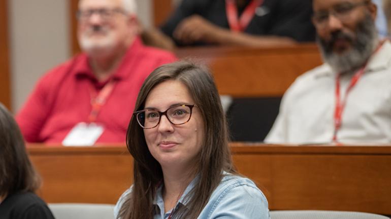 Executive students listening to a presentation