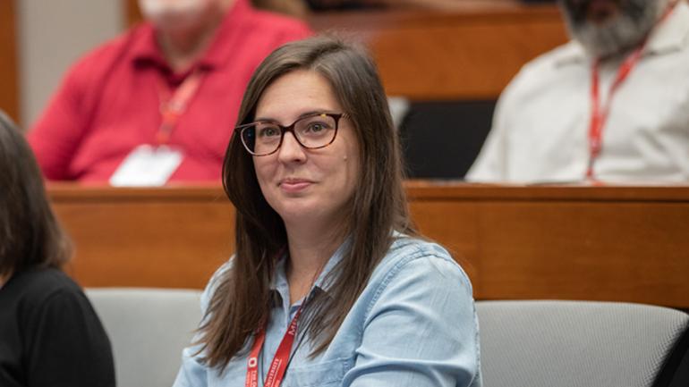 Executive students listening to a presentation