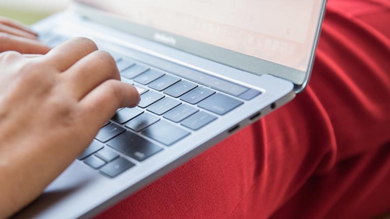typing on a laptop