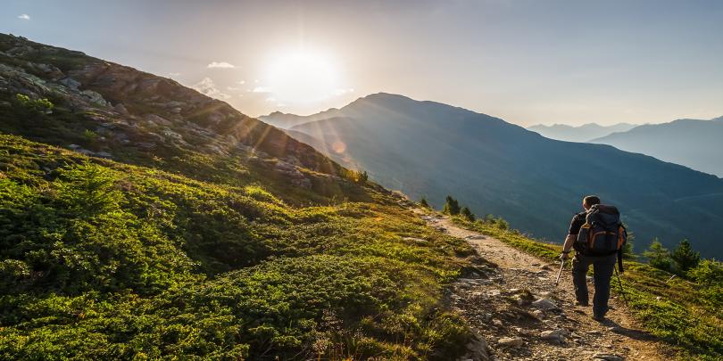 Man hiking through the mountains