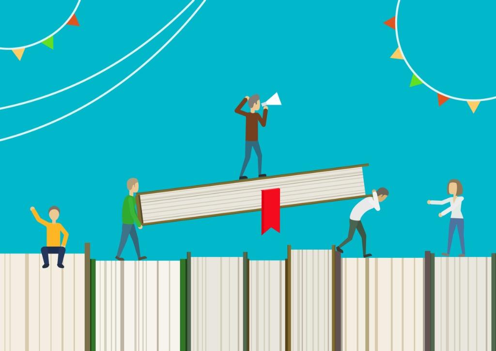 People holding up a person with a megaphone