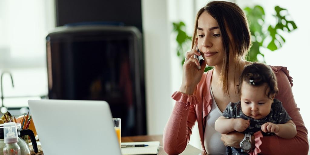 young mother working with child