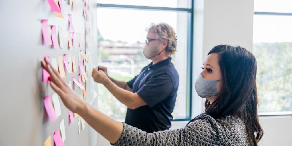 co-workers participating in a strategic planning exercise