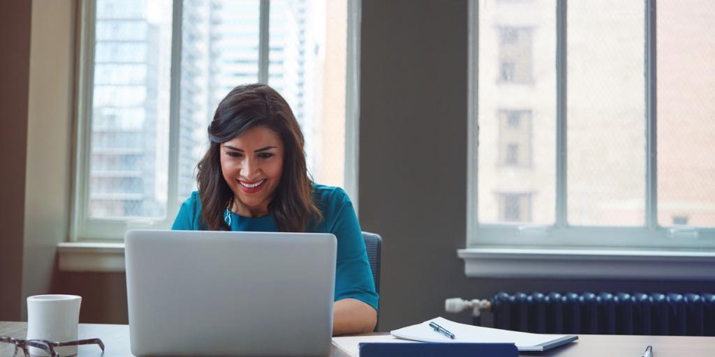 motivated worker on laptop
