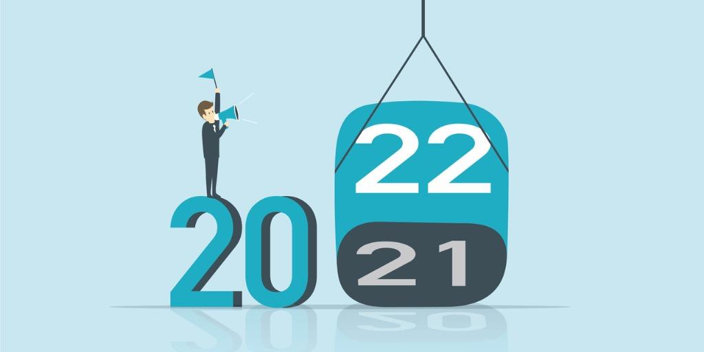 man changing year on calendar