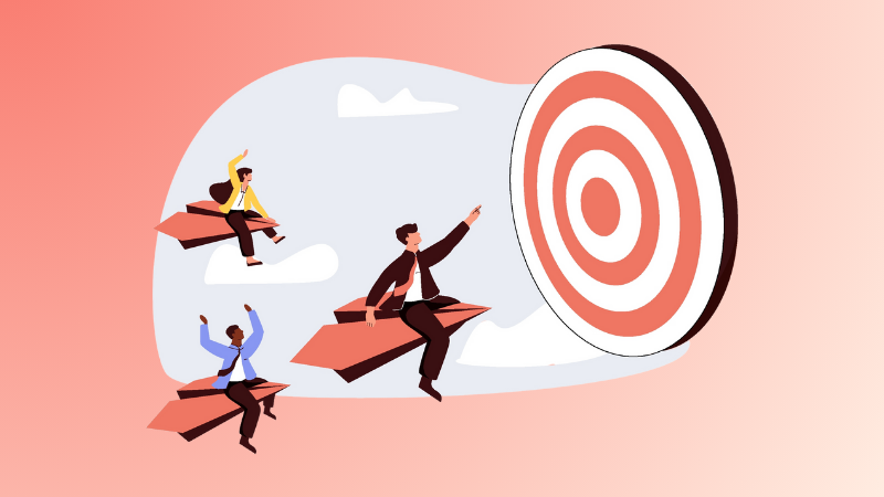 3 employees flying on paper airplanes toward a target