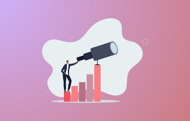 man looking through a telescope