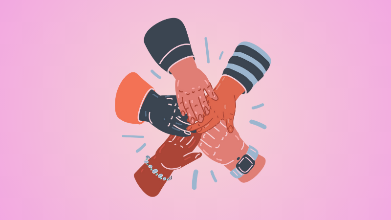 5 hands stacked to show teamwork