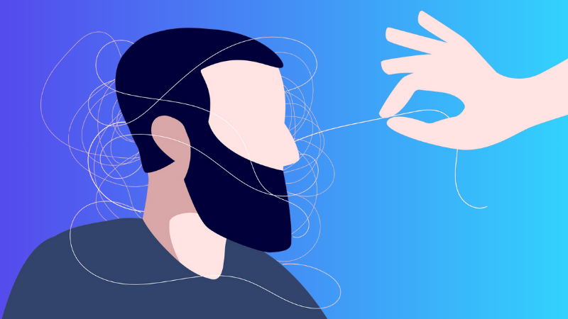 hand helping man whose head is tangled with spring