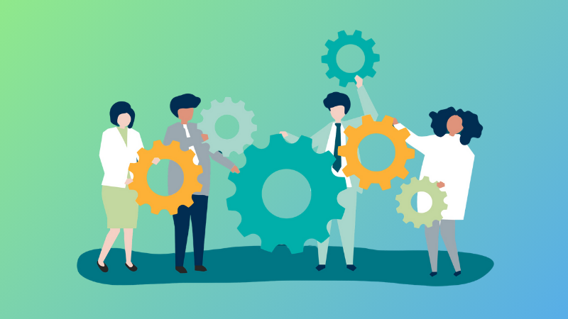 4 employees holding gears together