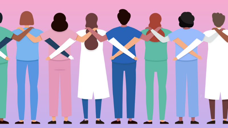 group of healthcare workers with arms linked