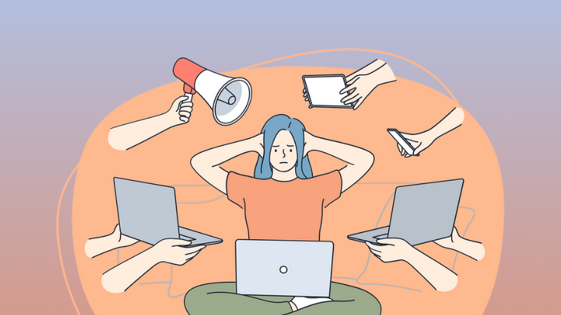 woman working from home overwhelmed with different things to do