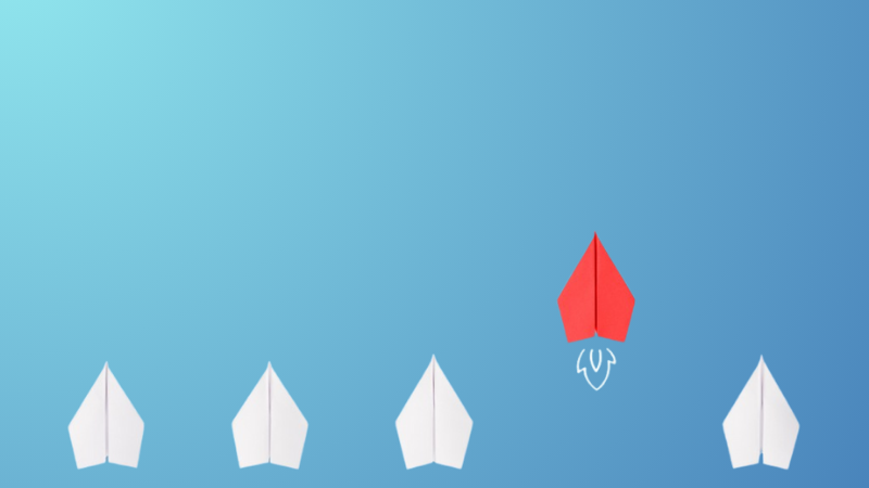 4 white and 1 red paper airplaines