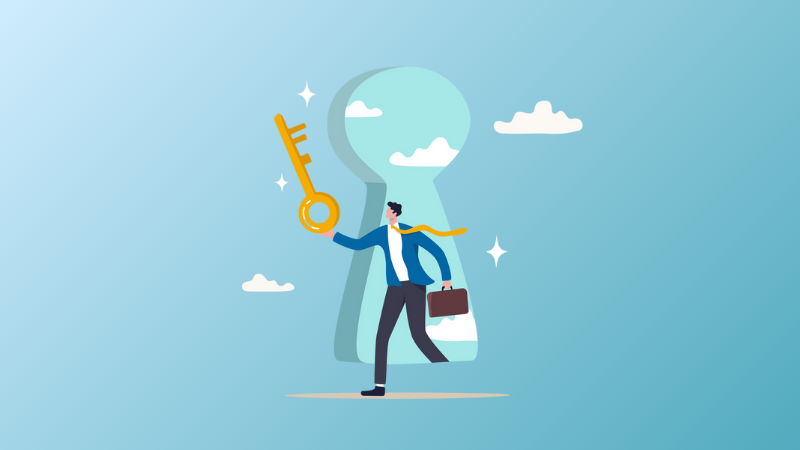 man holding a large key