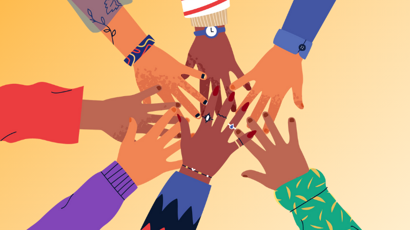 diverse group of hands high five