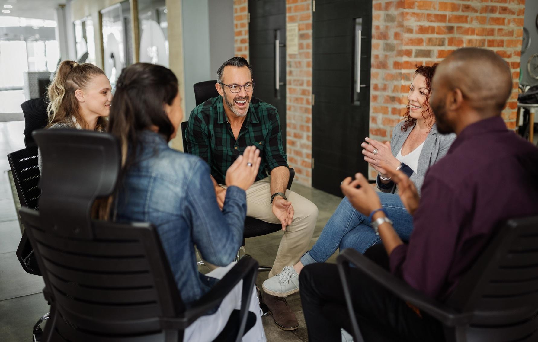 a team gathering in the conference room