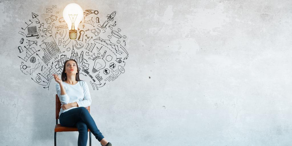 Women sitting with light bulb and several images representing ideas and innovation