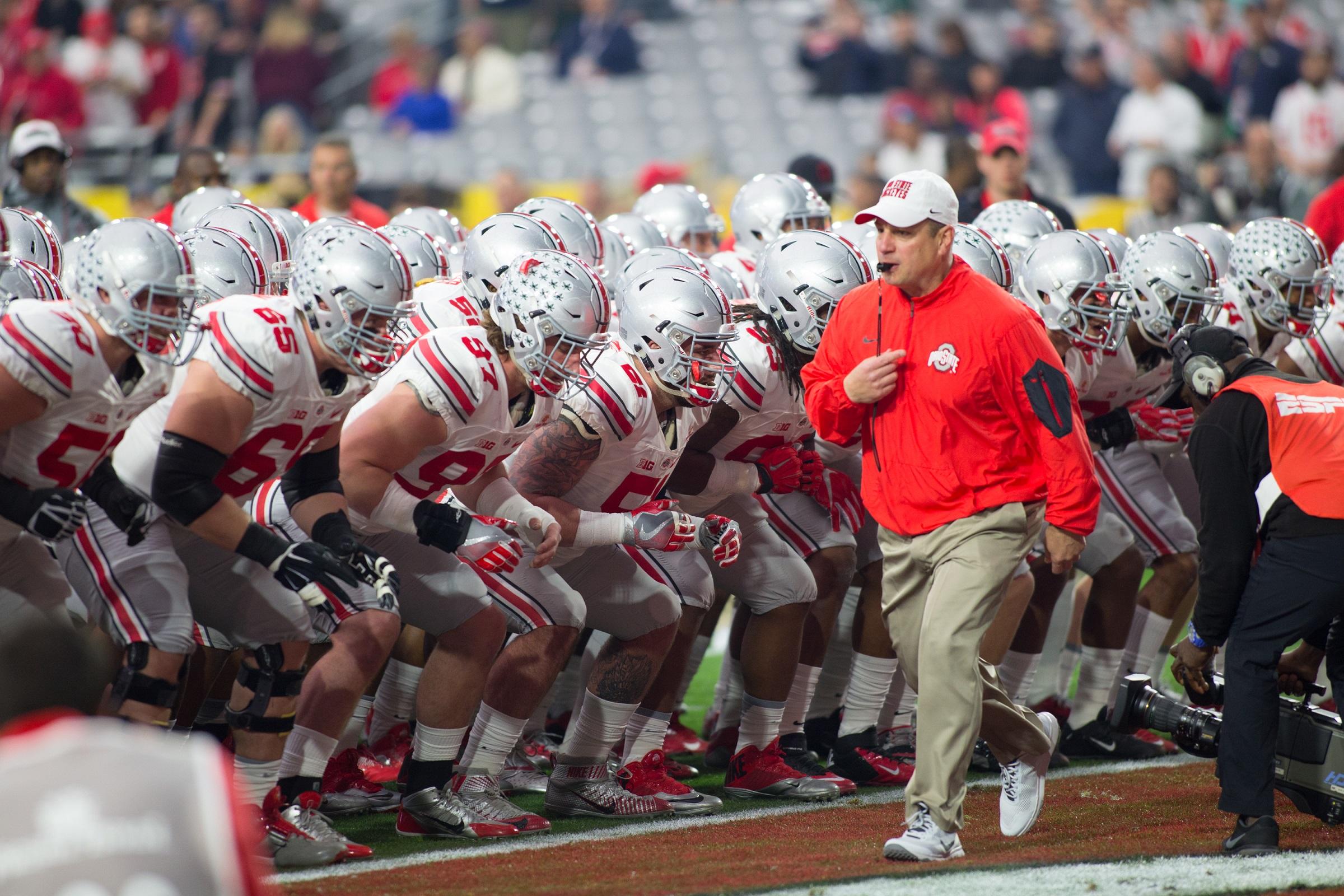 Coach Marotti on the field with Ohio State football players