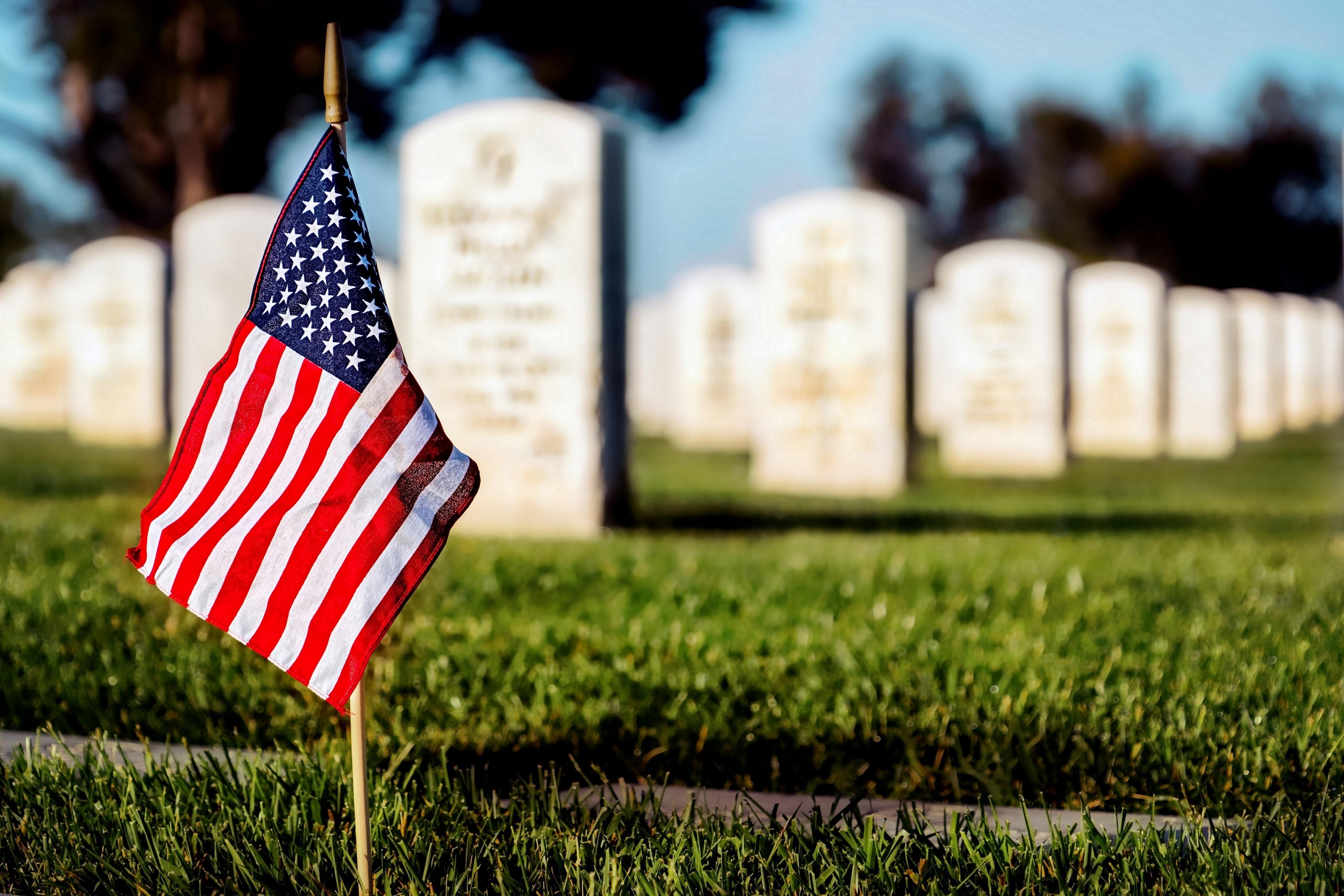 American flag in a military graveyard