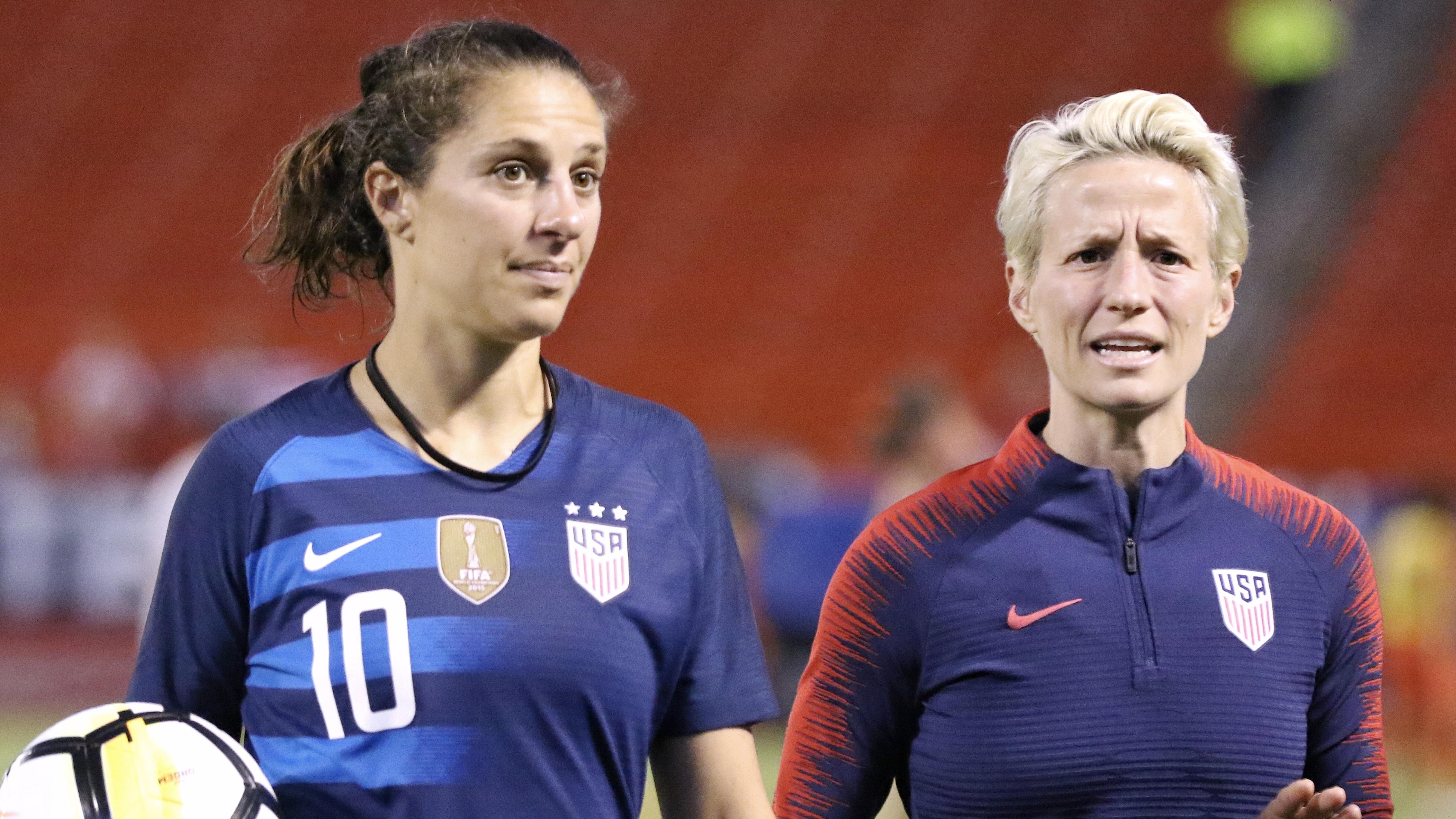 two soccer players from the United States Women’s National Team