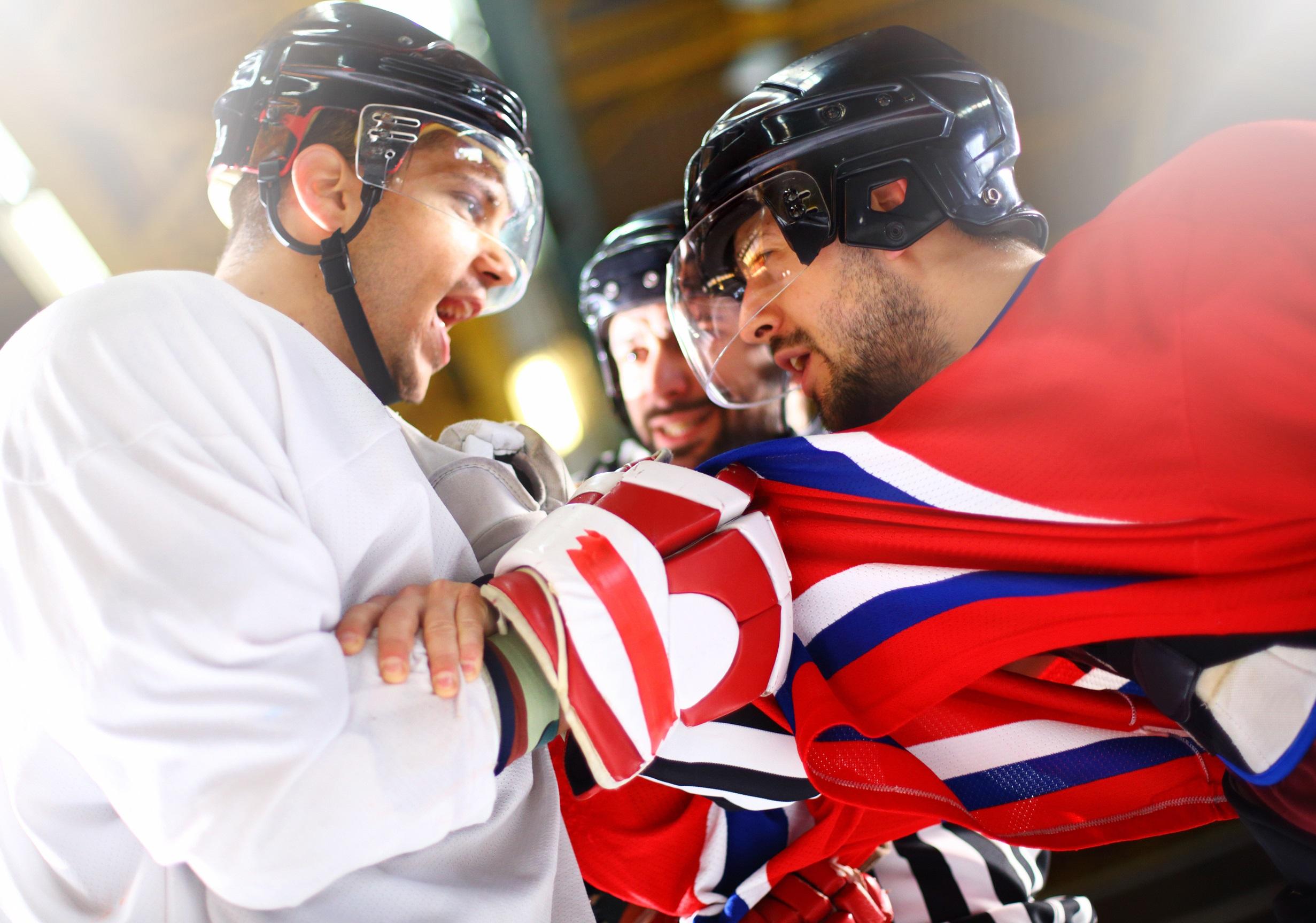 hockey players from opposing teams arguing