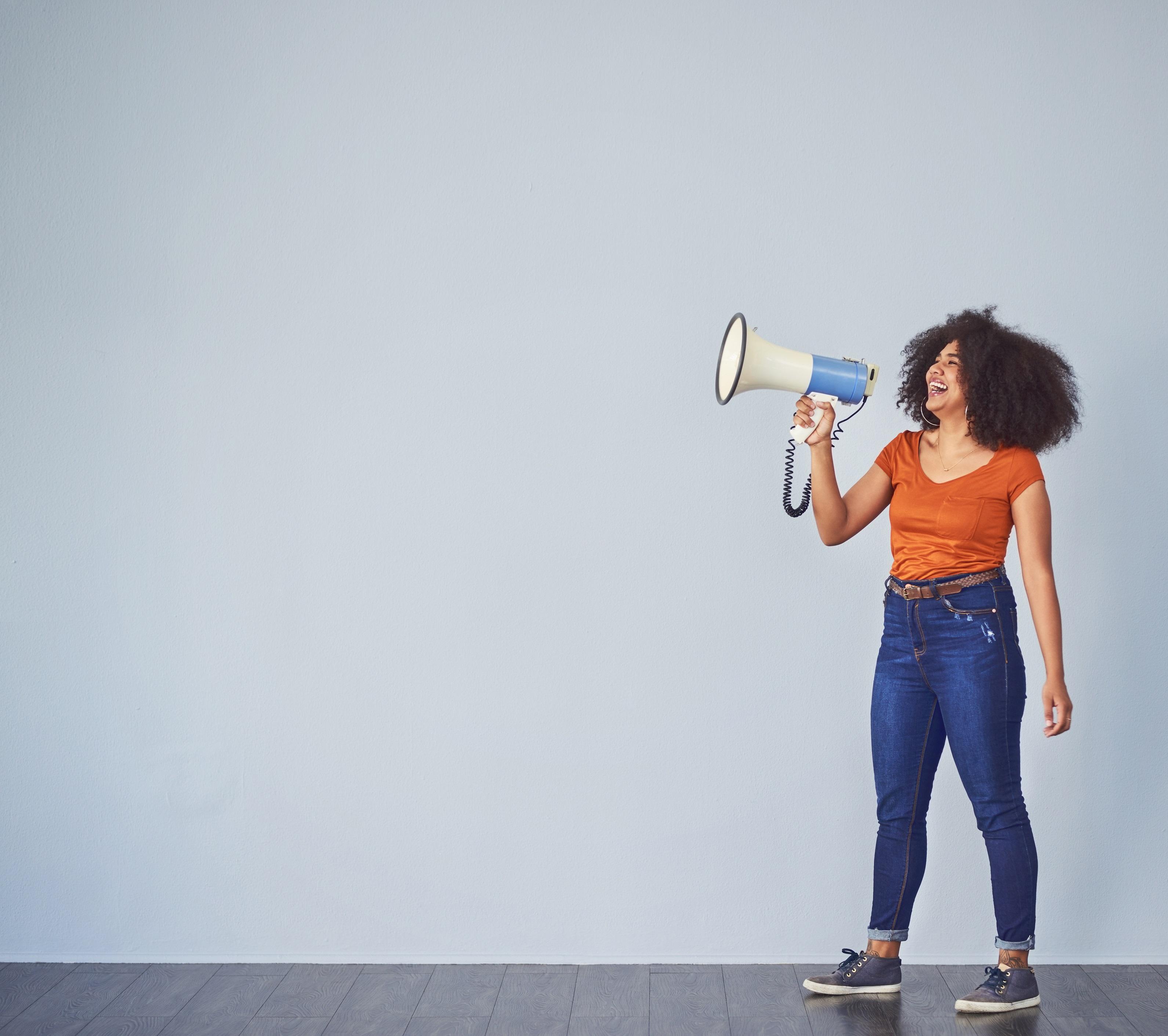 Woman speaking into a megaphone