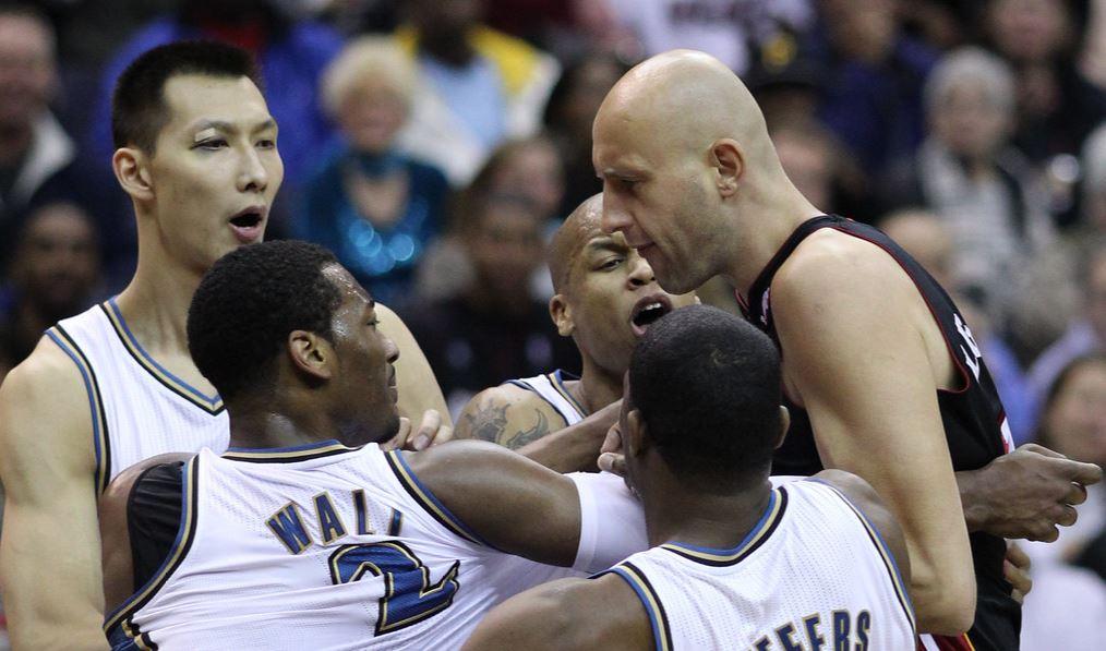 basketball players from separate teams angry at one another