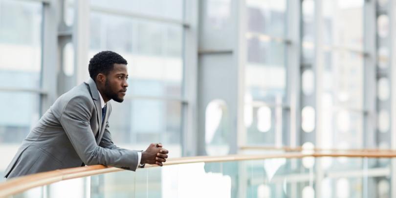 leader overlooking city while reflecting