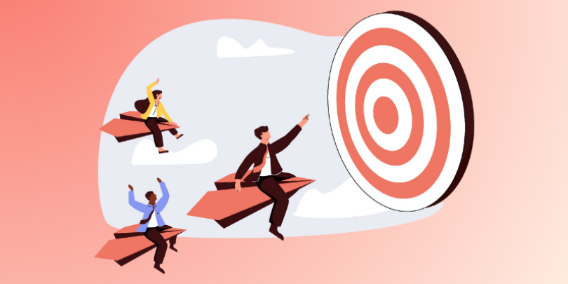 3 employees flying on paper airplanes toward a target