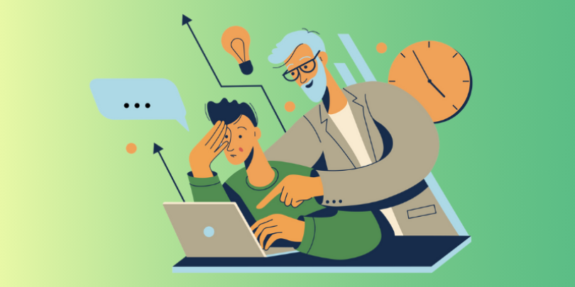 employee being coached in front of a computer