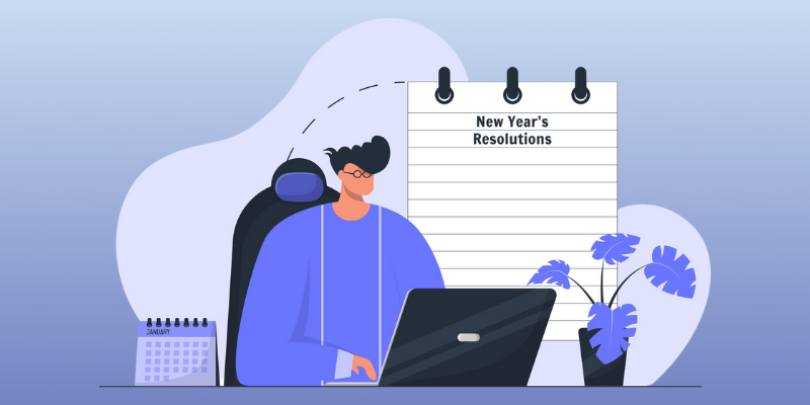 man writing new years resolutions