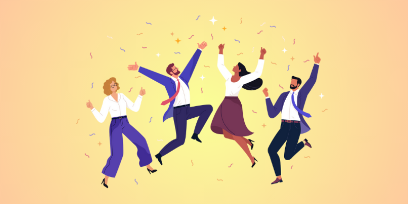 4 employees celebrating