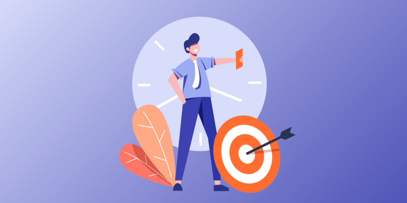 man proudly standing in front of bullseye target