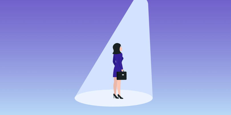 woman standing in a spotlight