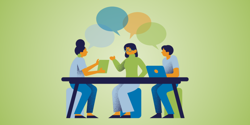 3 employees having a conversation