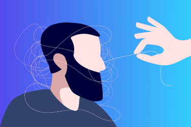 hand helping man whose head is tangled with spring