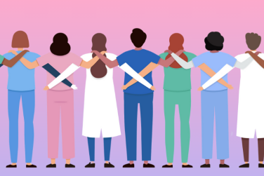 group of healthcare workers with arms linked