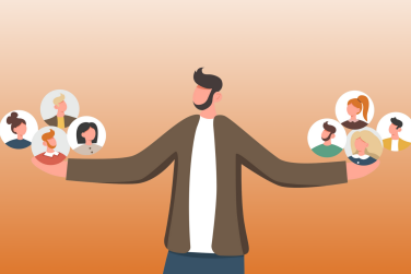 man holding bubbles in each hand with people's faces in them