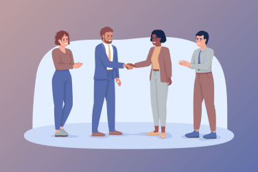 4 employees smiling and shaking hands with each other