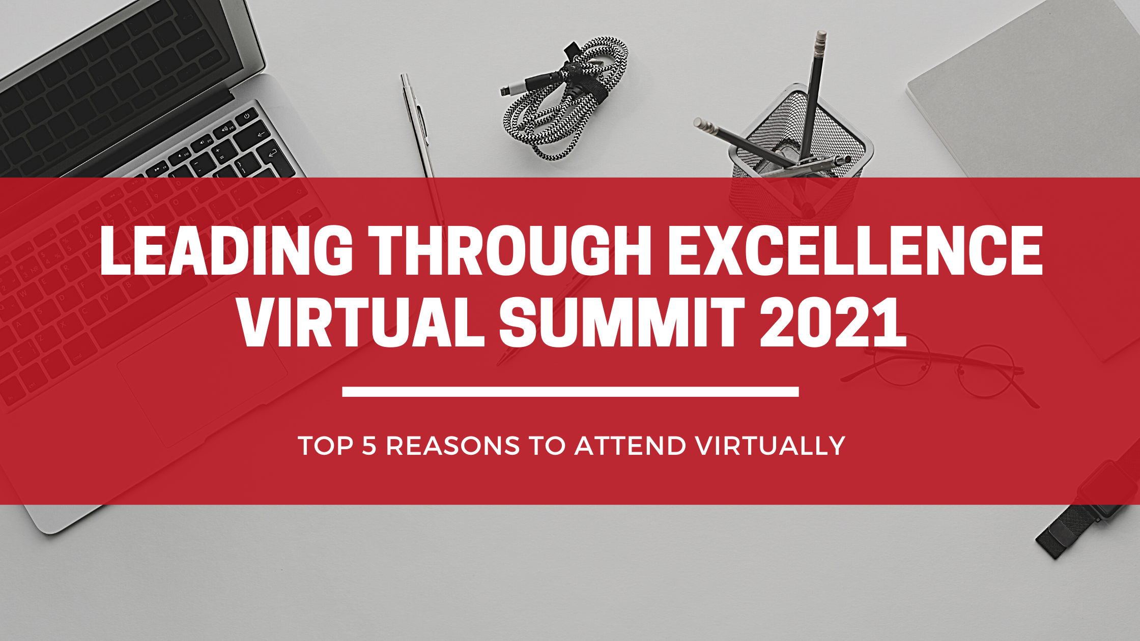 Desktop with laptop and pens with title overlay