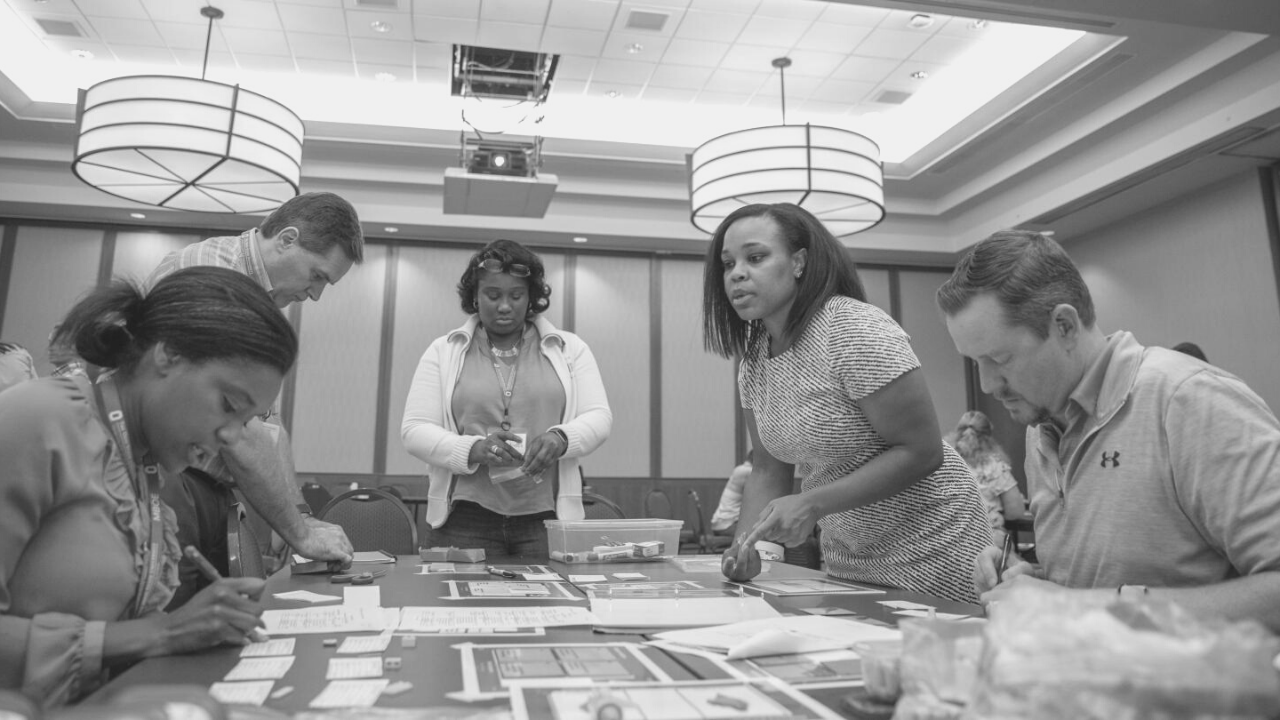 Black and white image of students participating in MBOE program