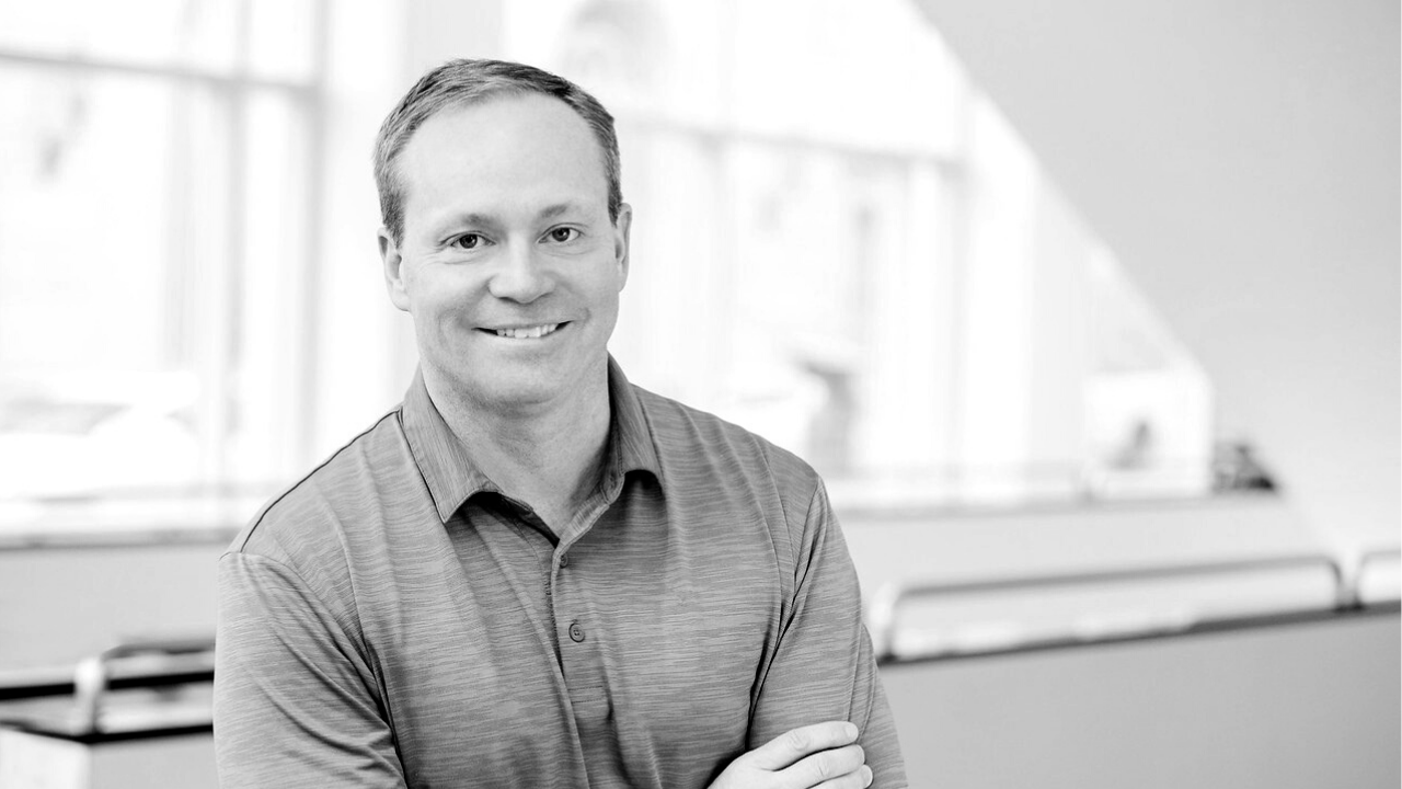 Black and white headshot of Larry English, Author of the Blog
