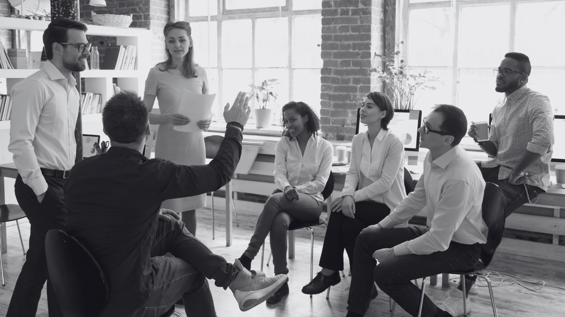 Group of coworkers meeting together