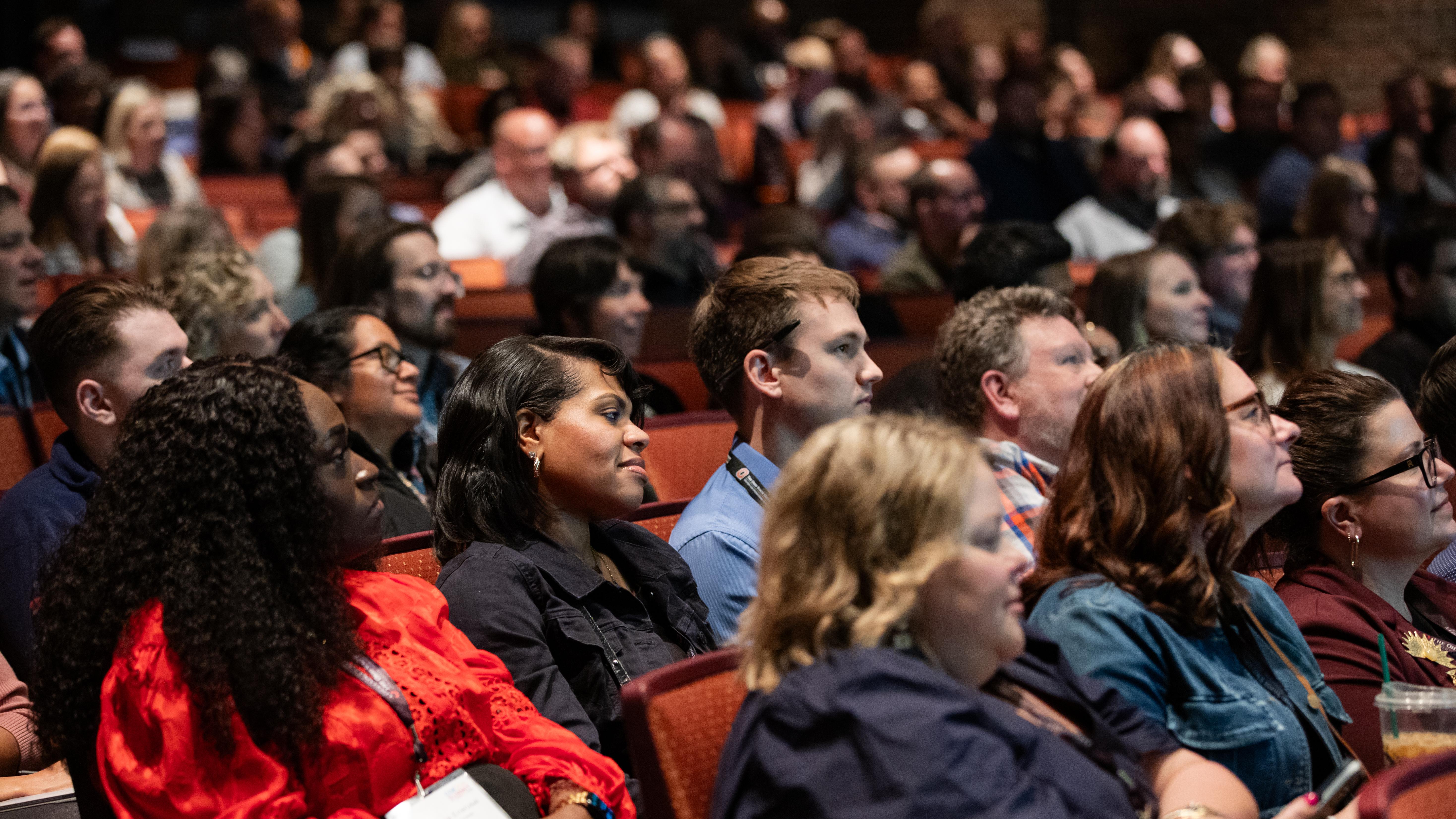Audience seated in theater style seating at COE Summit 2026