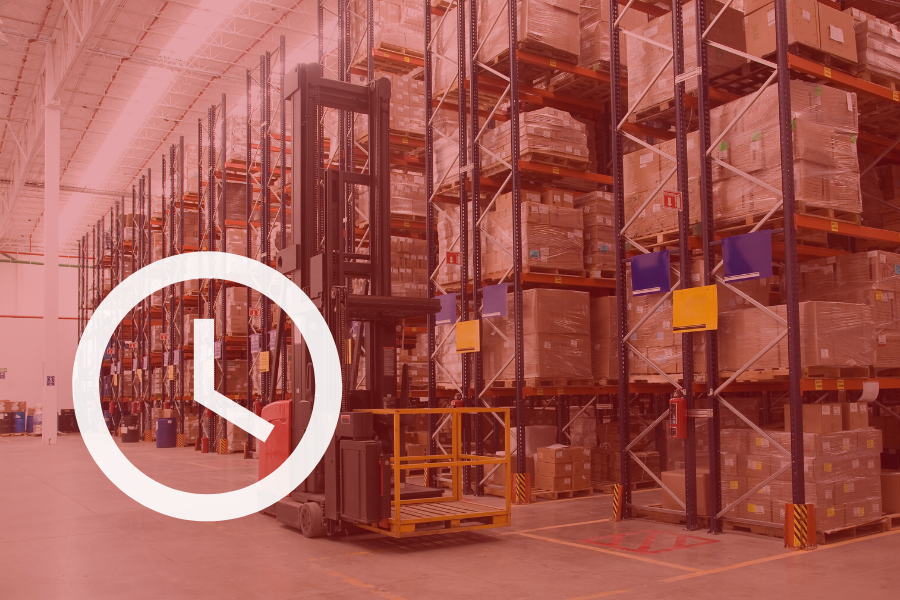 Clock graphic and red background over a warehouse