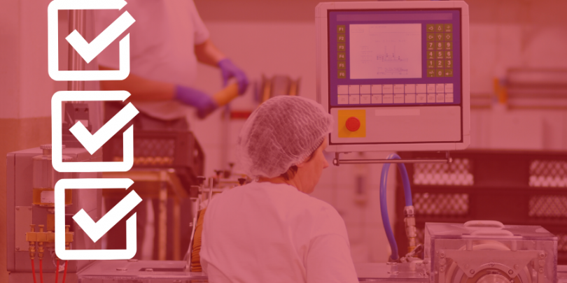 Woman in manufacturing setting with white checkmarks overlaid