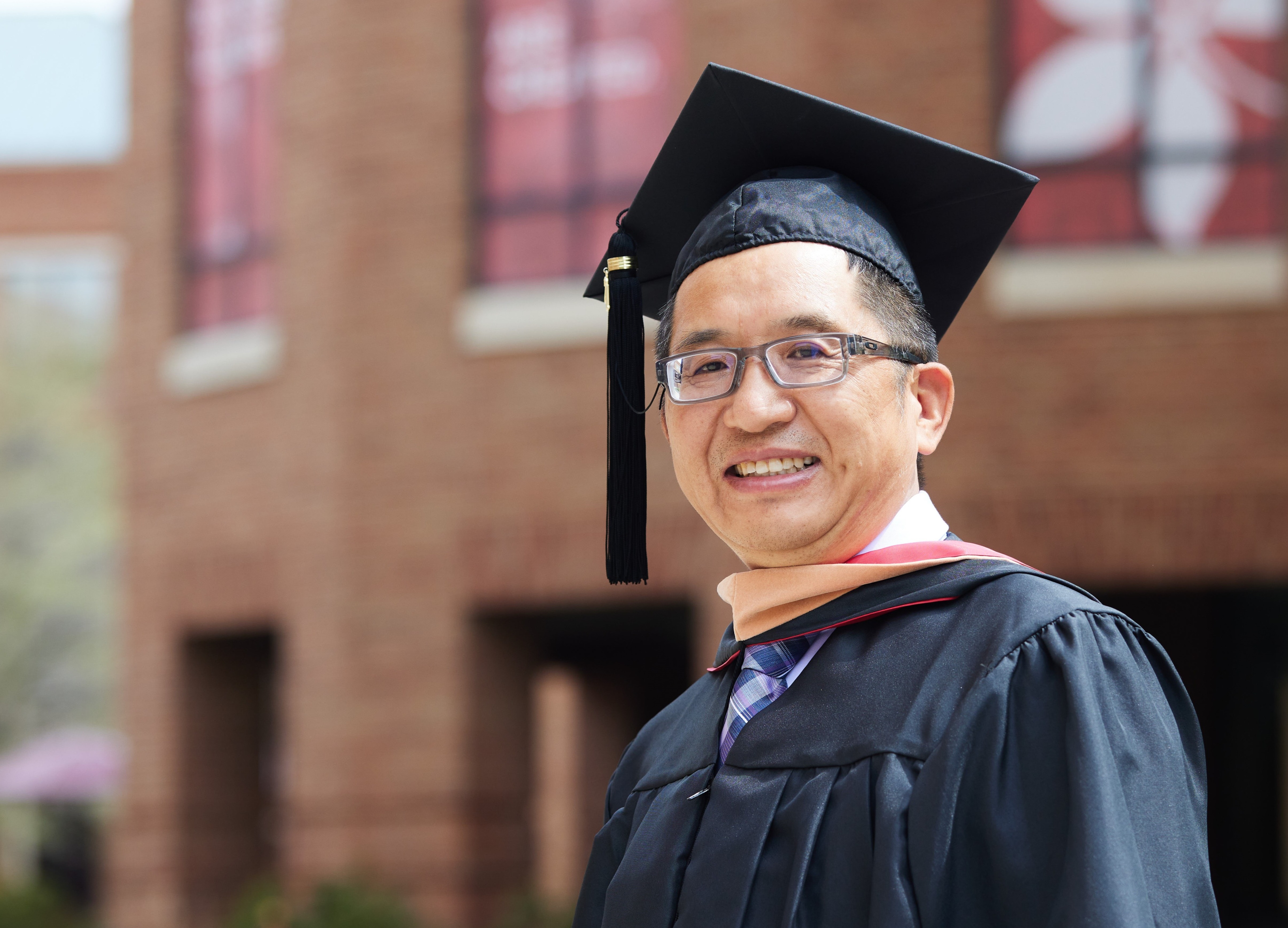 Henry Xiang in his cap and gown.